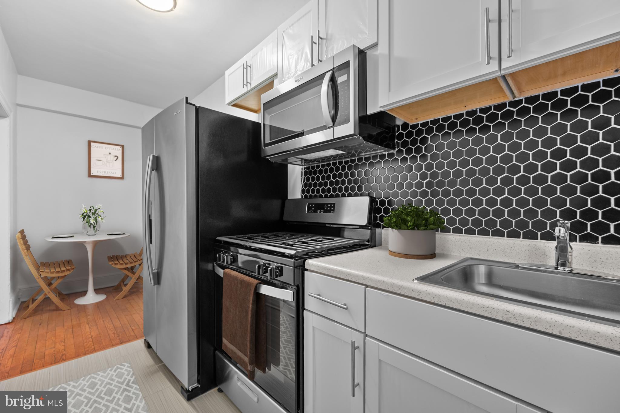 1457 Park Road Northwest, Unit 107 Washington, DC 20010 - Photo 19 of 42 Kitchen with virutual table.
