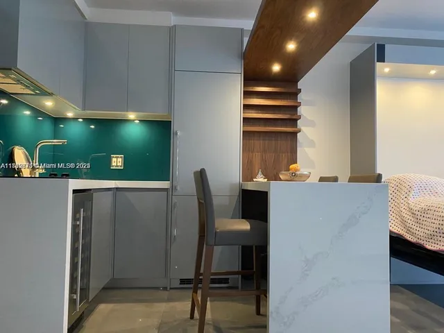 a workspace with furniture and window