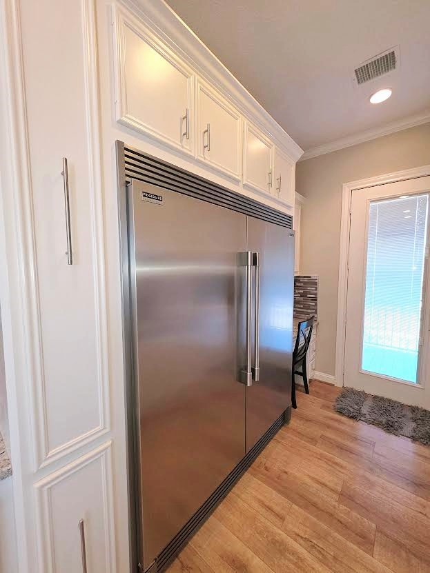 201 Coco Loop Point Blank, TX 77364 - Photo 14 of 50 The photo featuring a extra large capacity double door refridgerator with ice maker and water dispenser inside. Perfectly situated across from the coffee bar.