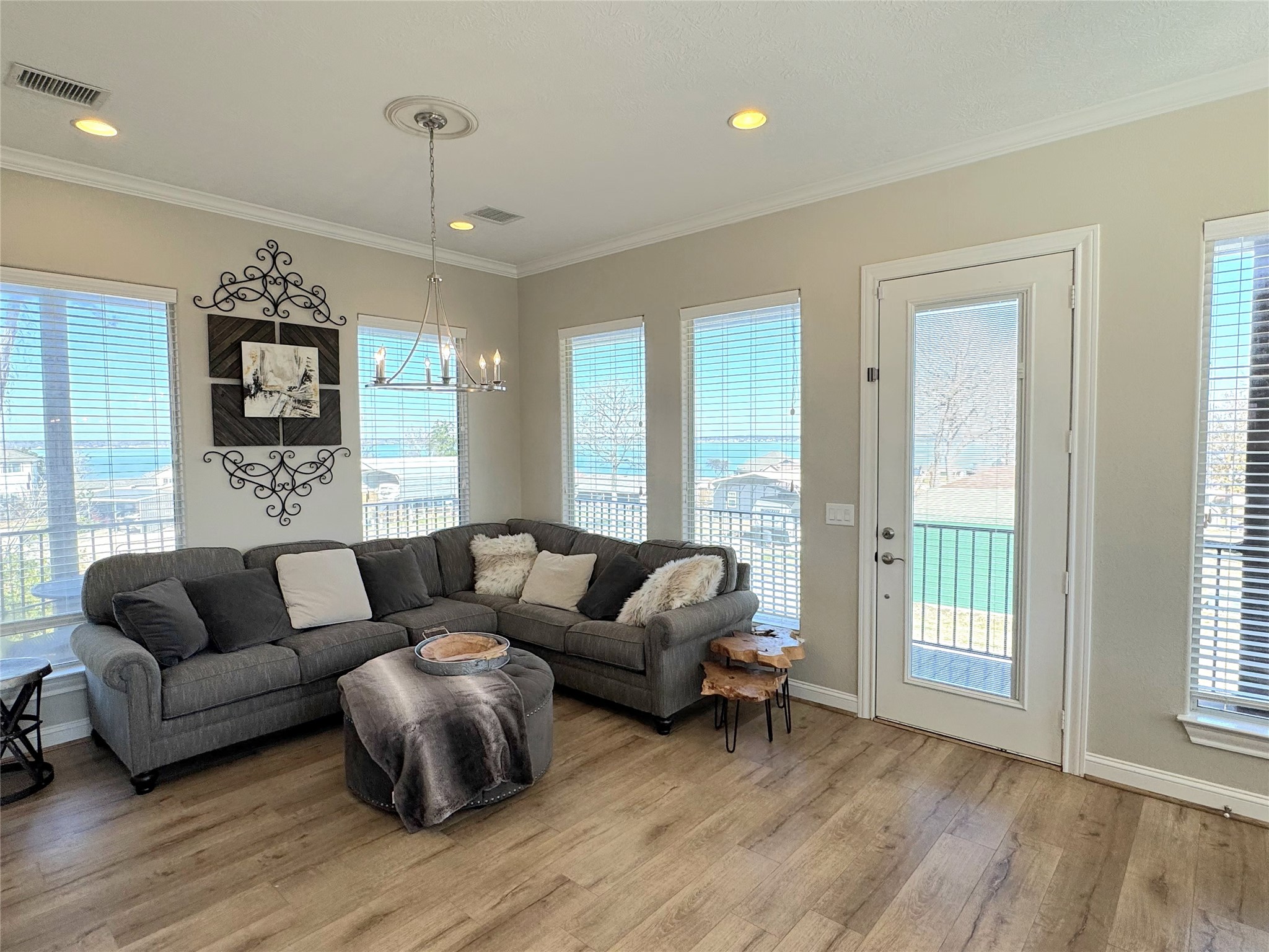 201 Coco Loop Point Blank, TX 77364 - Photo 22 of 50 Photo featuring warm welcoming color scheme, door leading to the 3rd floor deck and some amazing waterviews!