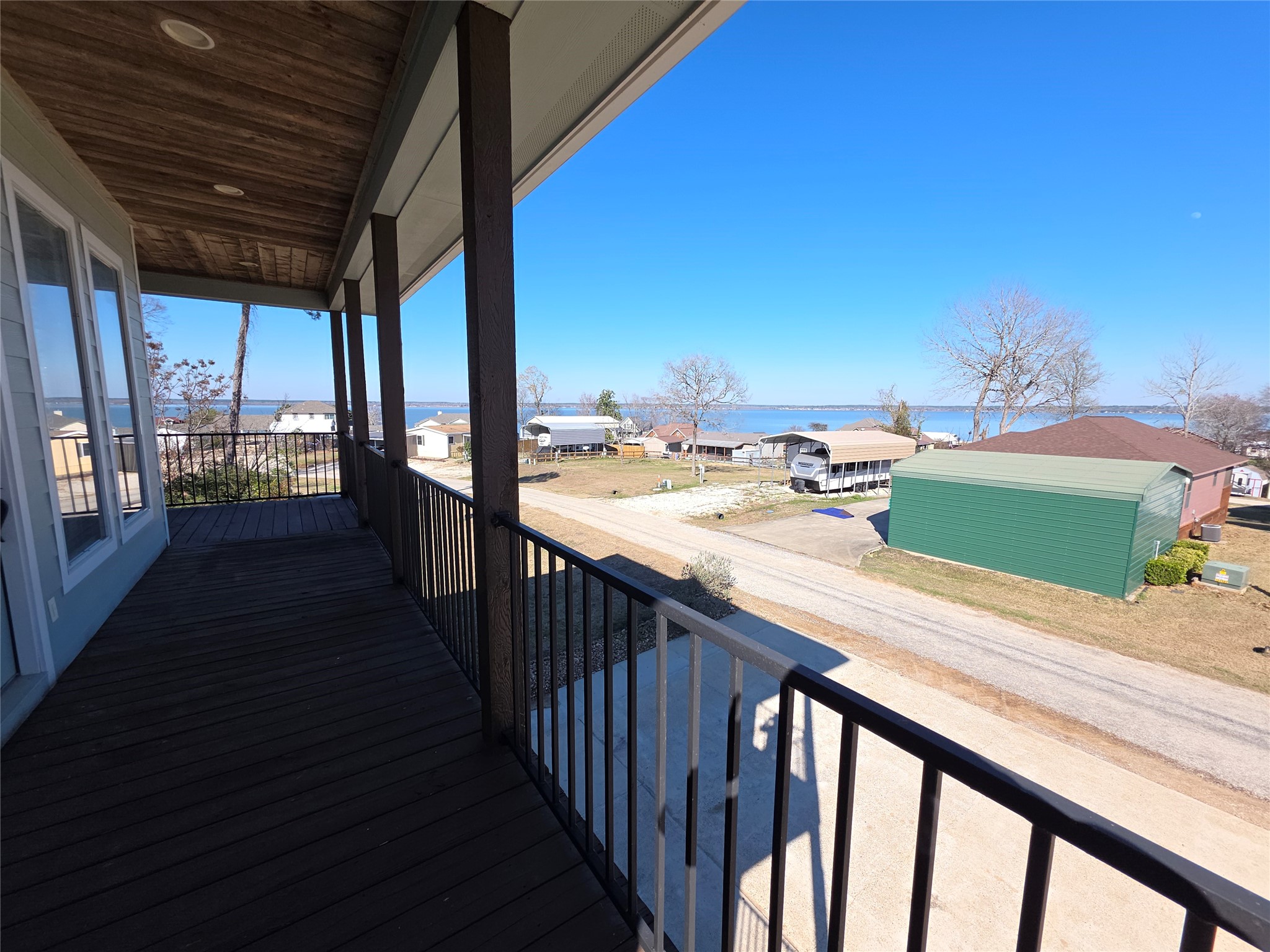 201 Coco Loop Point Blank, TX 77364 - Photo 32 of 50 Feature 2nd floor deck off the Master Bedroom, more amazing water views