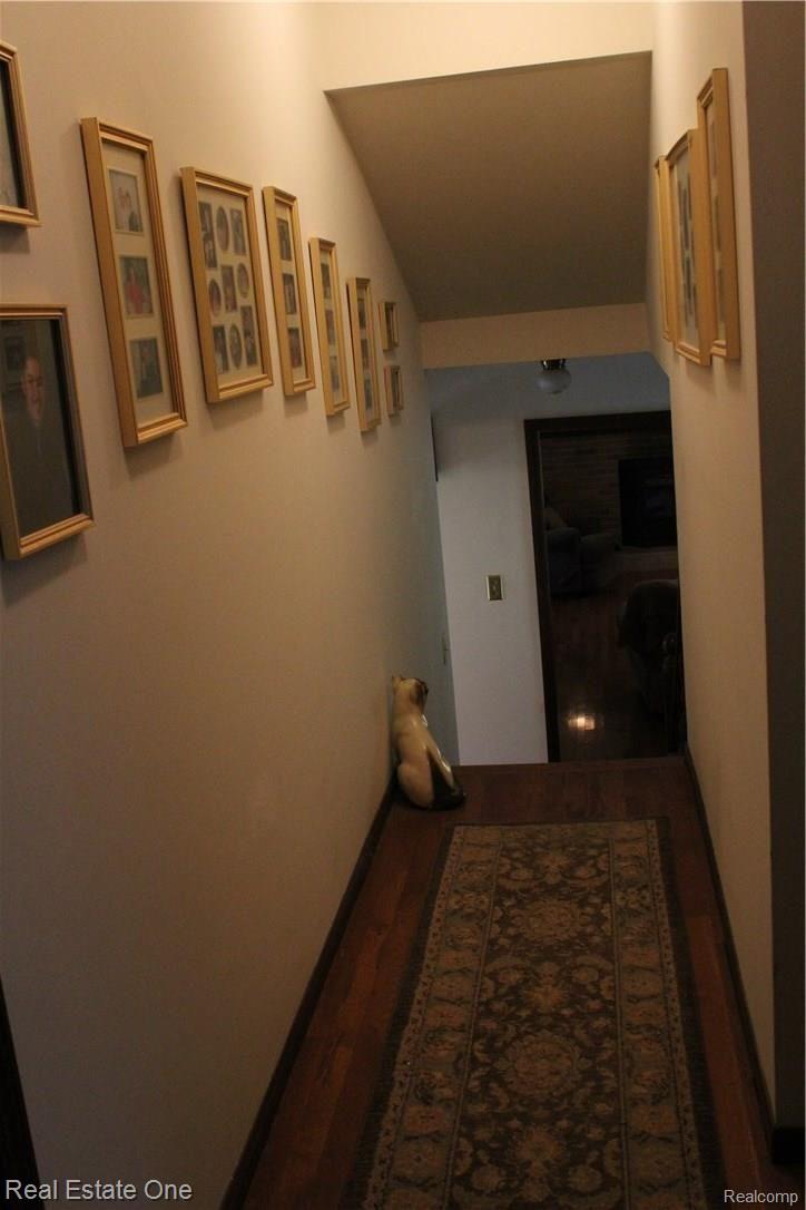 6474 Byron Road Howell, MI 48855 - Photo 40 of 62 HALLWAY TO MAIN LEVEL