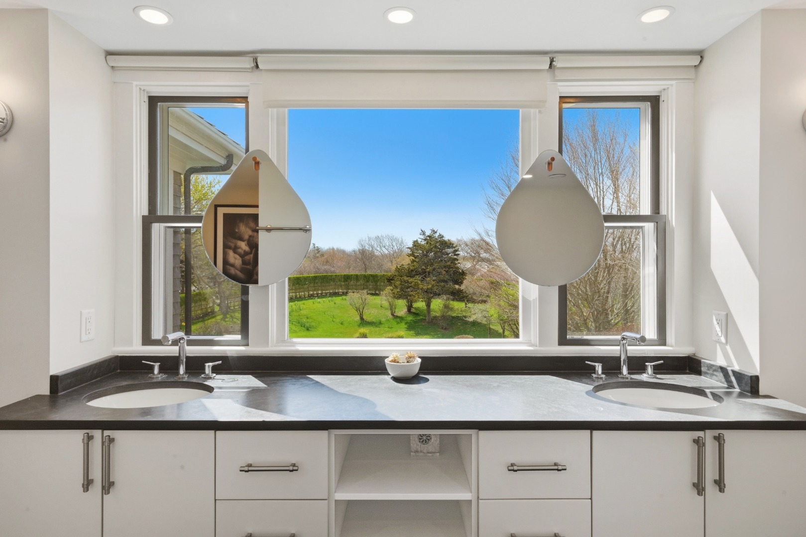 247 Polpis Road Nantucket, MA 02554 - Photo 22 of 52 a bathroom with a granite countertop sink and a mirror