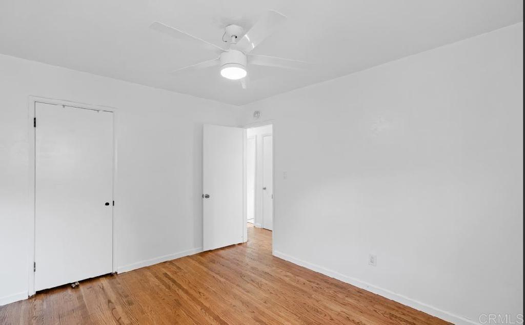 3964 Delta Street San Diego, CA 92113 - Photo 16 of 35 a view of an empty room with wooden floor