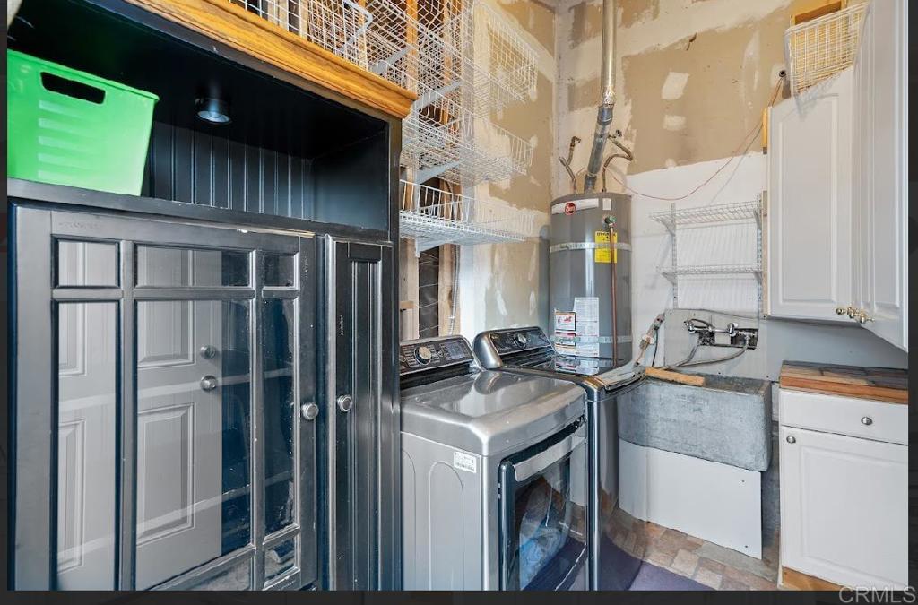 3964 Delta Street San Diego, CA 92113 - Photo 24 of 35 a kitchen with stainless steel appliances granite countertop a sink a stove and a refrigerator