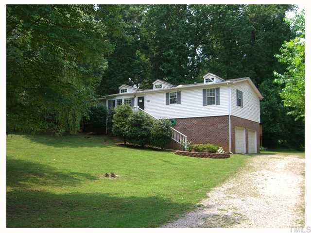204 Irelan Drive Raleigh, NC 27606 - Photo 1 of 12 a front view of a house with a yard