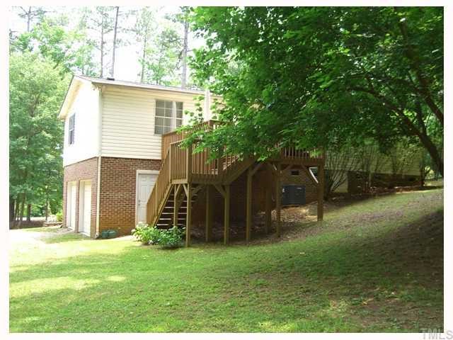 204 Irelan Drive Raleigh, NC 27606 - Photo 3 of 12 a backyard of a house with lots of green space