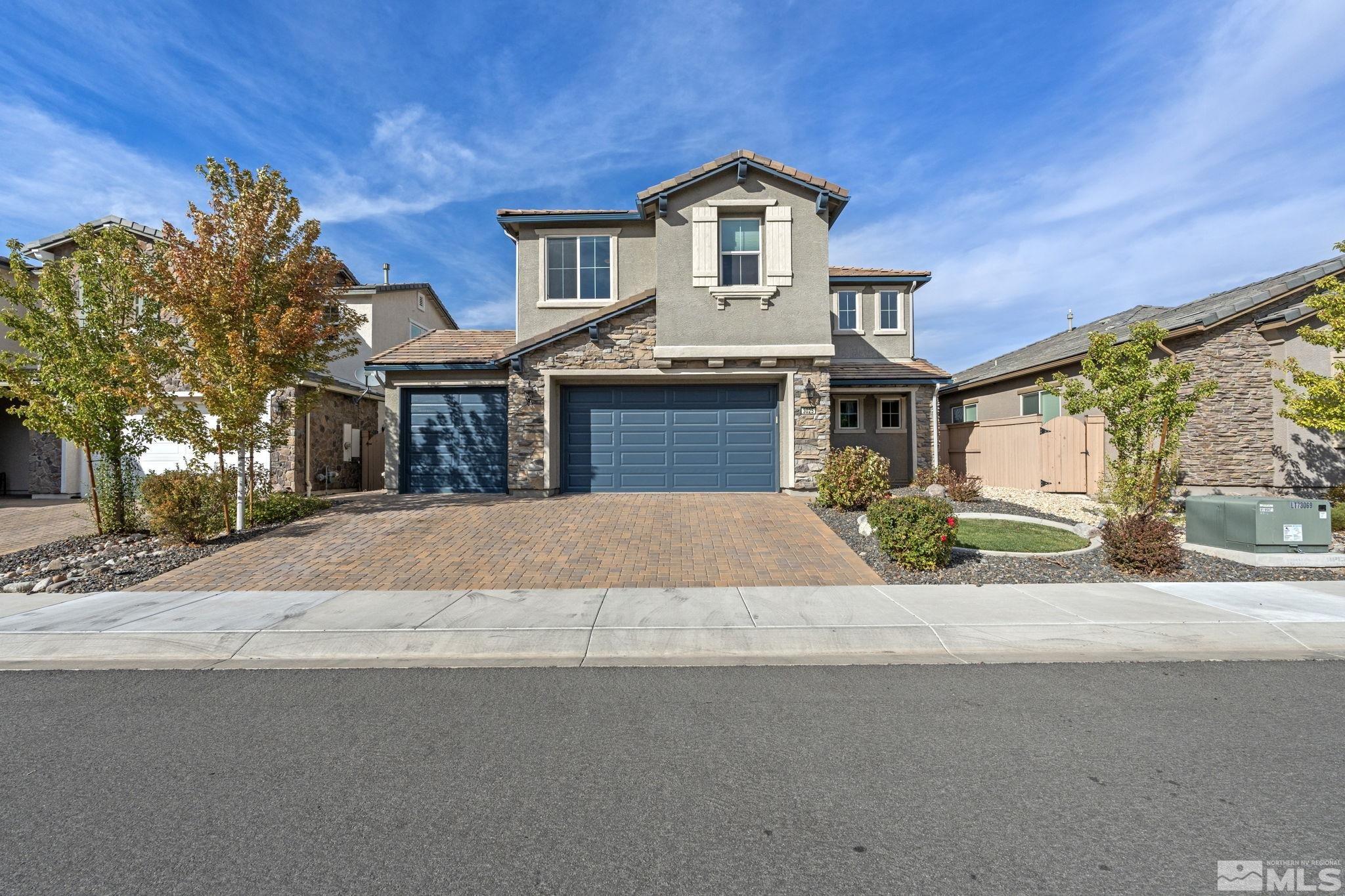 3025 Ethelinda Way Reno, NV 89521 - Photo 1 of 31 a front view of a house with a outdoor space