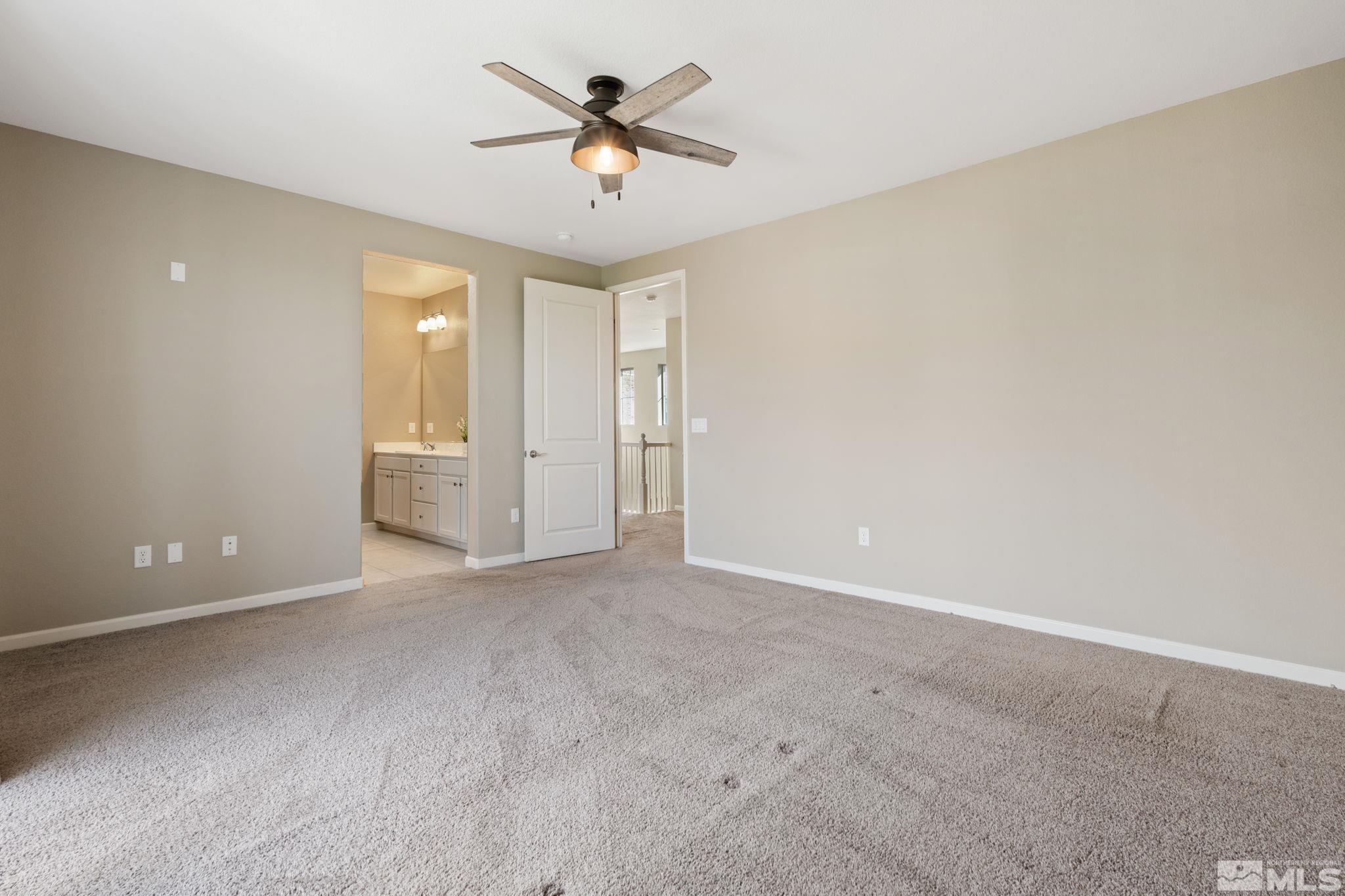 3025 Ethelinda Way Reno, NV 89521 - Photo 15 of 31 an empty room with a empty space and a ceiling fan