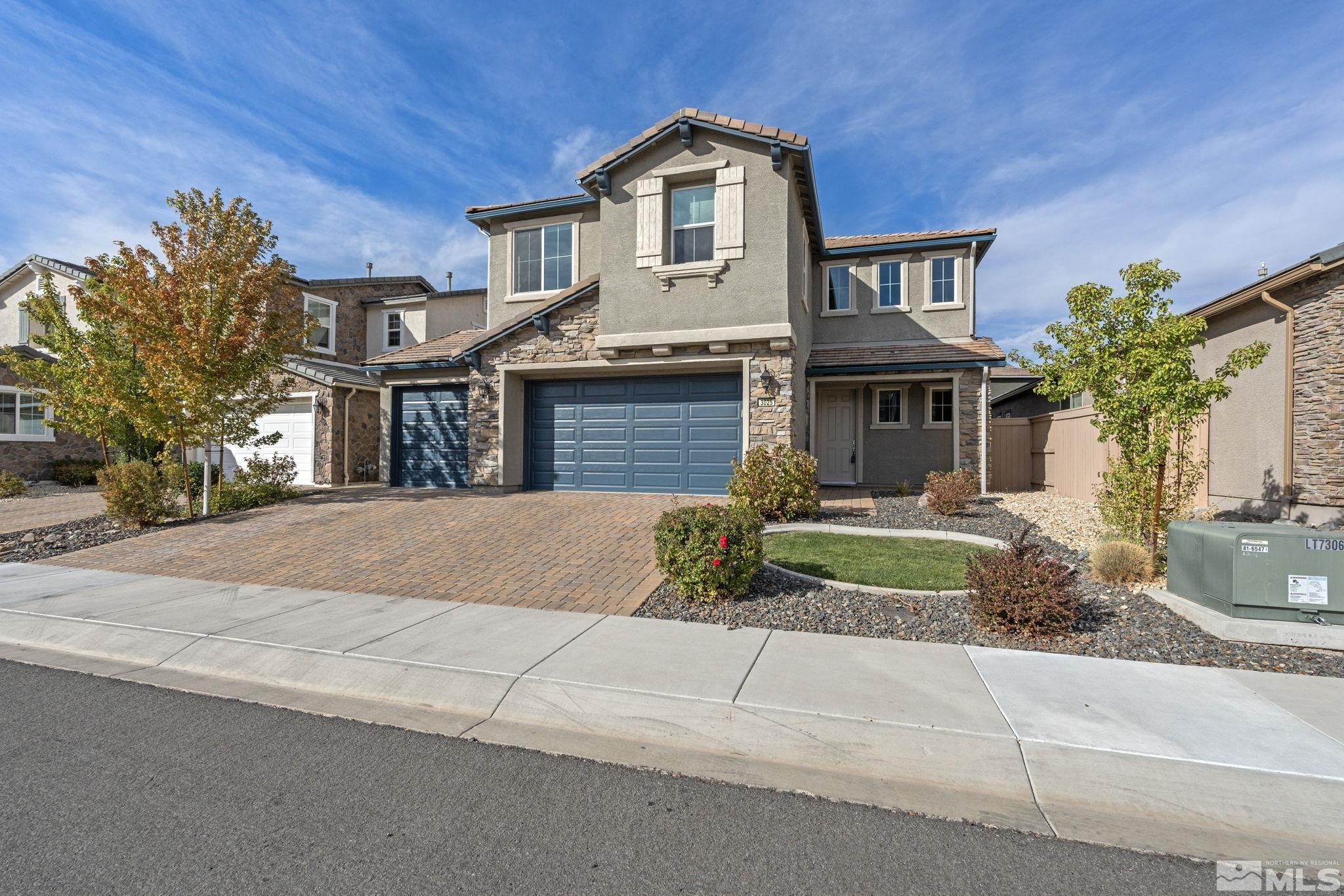 3025 Ethelinda Way Reno, NV 89521 - Photo 2 of 31 a front view of a house with a yard