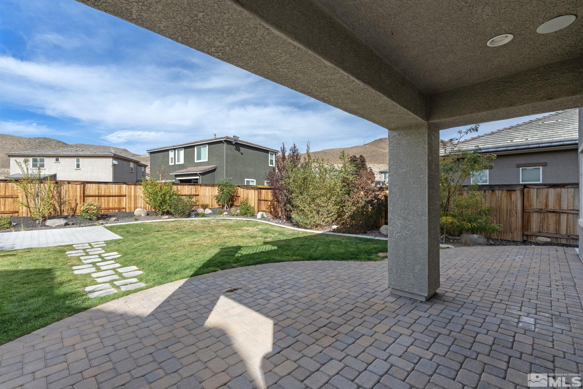 3025 Ethelinda Way Reno, NV 89521 - Photo 25 of 31 a view of a house with a yard