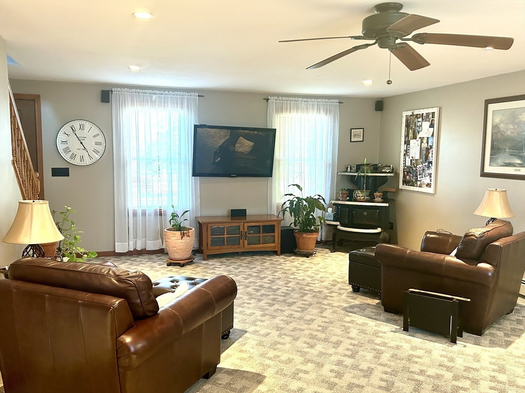 43 Boston Hill Road Fairhaven, MA 02719 - Photo 14 of 25 a living room with furniture and a flat screen tv