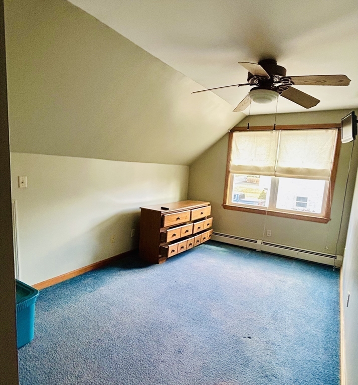 43 Boston Hill Road Fairhaven, MA 02719 - Photo 20 of 25 a room with a bed and a chandelier