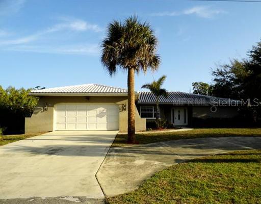 1523 Robbins Road Nokomis, FL 34275 - Photo 1 of 1 a front view of a house with a yard