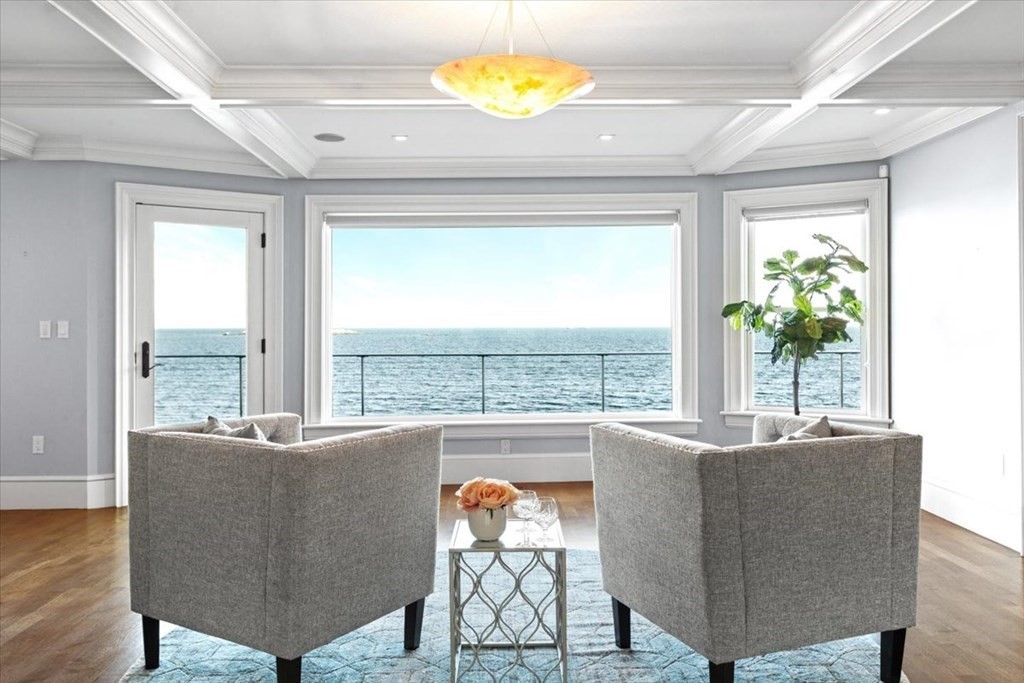 15 Spray Avenue Marblehead, MA 01945 - Photo 14 of 42 a living room with furniture and a large window