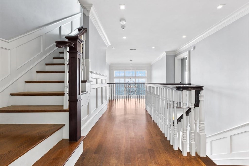 15 Spray Avenue Marblehead, MA 01945 - Photo 20 of 42 a view of staircase with wooden floor and a window