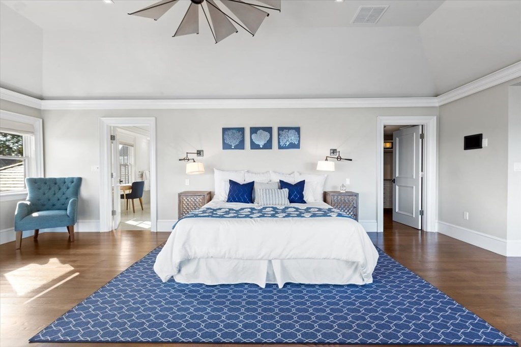 15 Spray Avenue Marblehead, MA 01945 - Photo 22 of 42 a bedroom with a bed and wooden floor