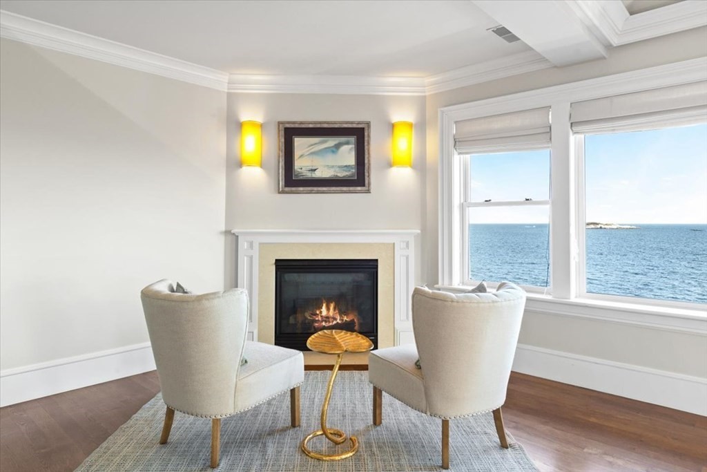 15 Spray Avenue Marblehead, MA 01945 - Photo 24 of 42 a view of a dining room with furniture window and wooden floor