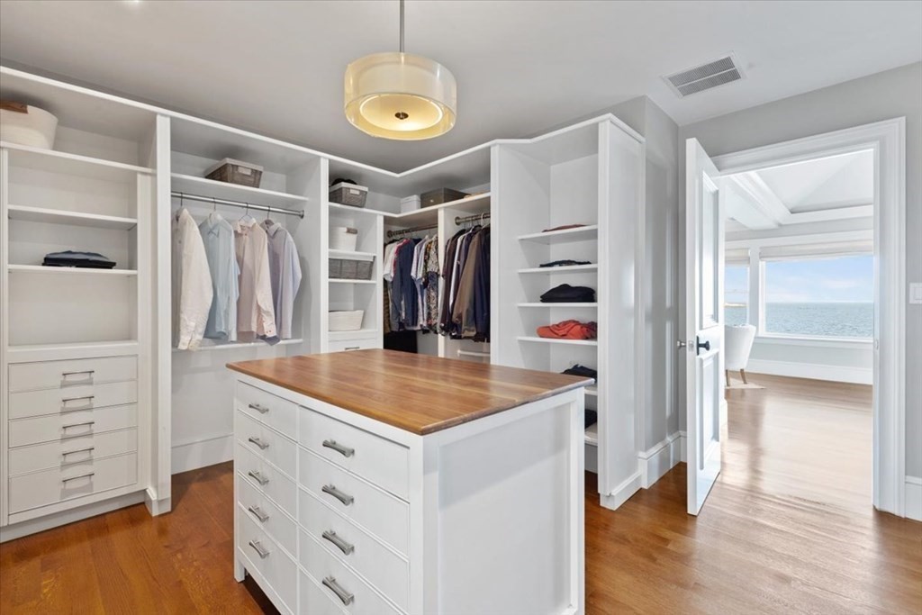 15 Spray Avenue Marblehead, MA 01945 - Photo 28 of 42 a kitchen that has a lot of cabinets in it