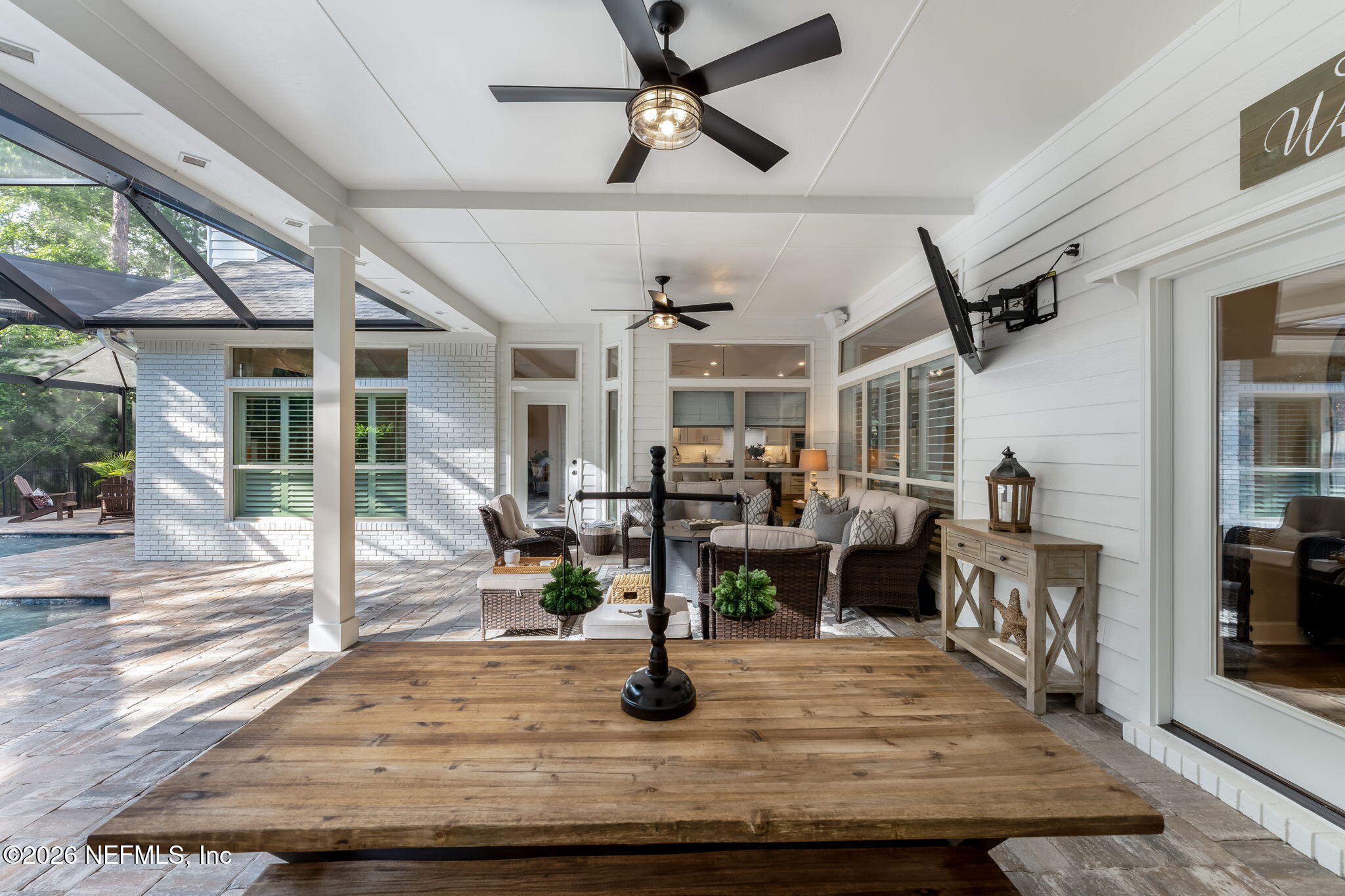 1204 Creek Bend Road St. Johns, FL 32259 - Photo 79 of 107 a living room with lots of furniture and a wooden floor