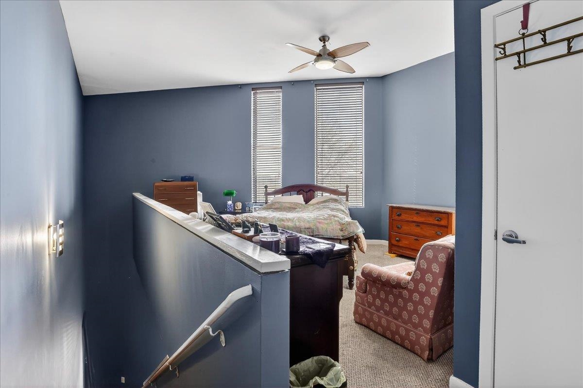 440 North Front Street, Unit 202 Memphis, TN 38105 - Photo 11 of 20 a living room with furniture and a window