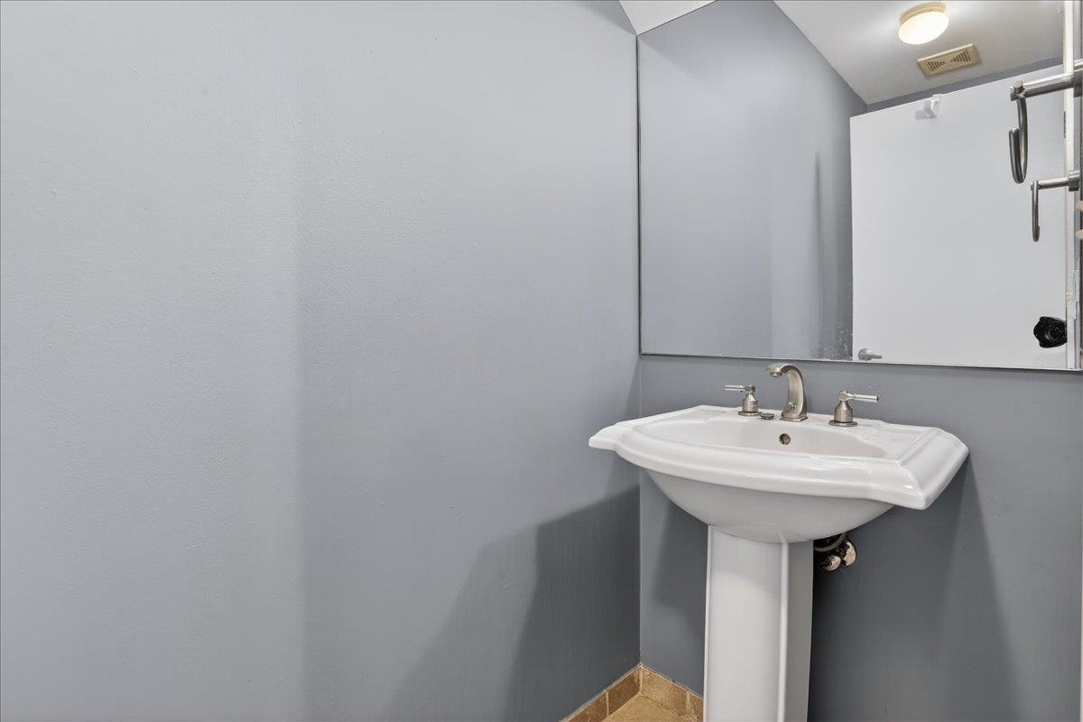 440 North Front Street, Unit 202 Memphis, TN 38105 - Photo 15 of 20 a sink with a mirror