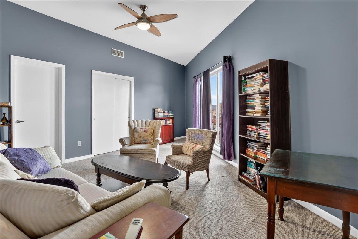 440 North Front Street, Unit 202 Memphis, TN 38105 - Photo 18 of 20 a living room with furniture and a window