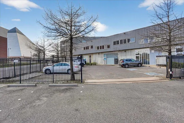 a view of a building with a street