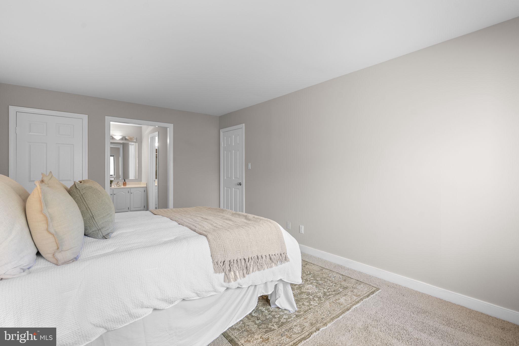 11420 Strand Drive, Unit R010 Rockville, MD 20852 - Photo 23 of 56 Primary Bedroom Suite