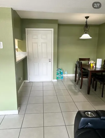 a view of a livingroom with furniture and window