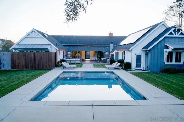 a view of backyard with seating space