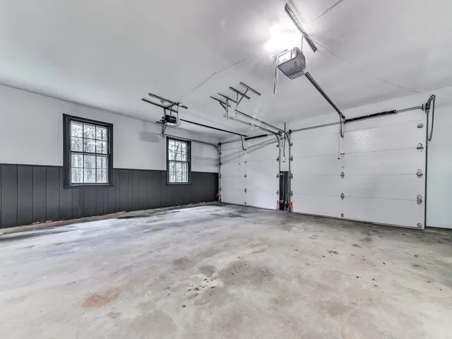 a view of empty room with windows