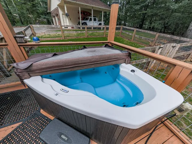 a view of a chairs and table in the balcony