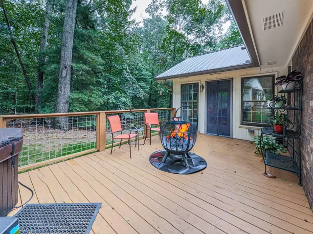 a view of house with outdoor seating