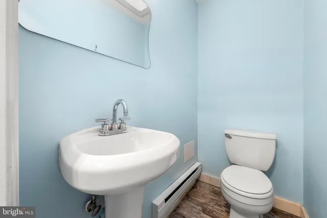 a bedroom with a bed and lamp