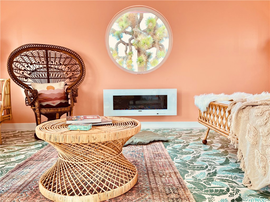 56345 Moonstone Road Yucca Valley, CA 92284 - Photo 19 of 69 a living room with a couch and a table