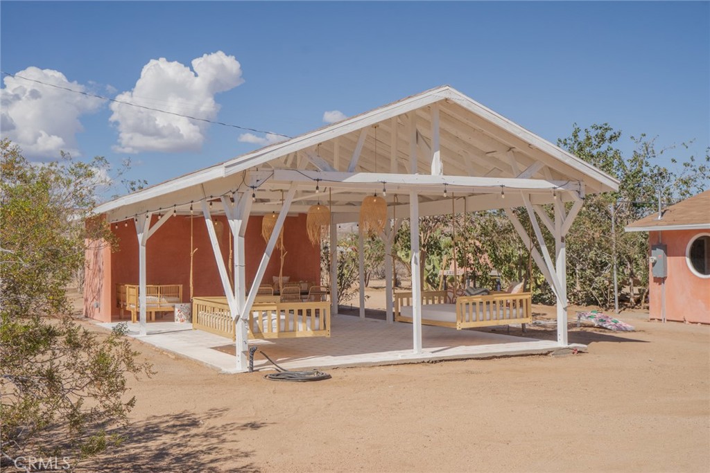 56345 Moonstone Road Yucca Valley, CA 92284 - Photo 2 of 69 a view of a building with a park