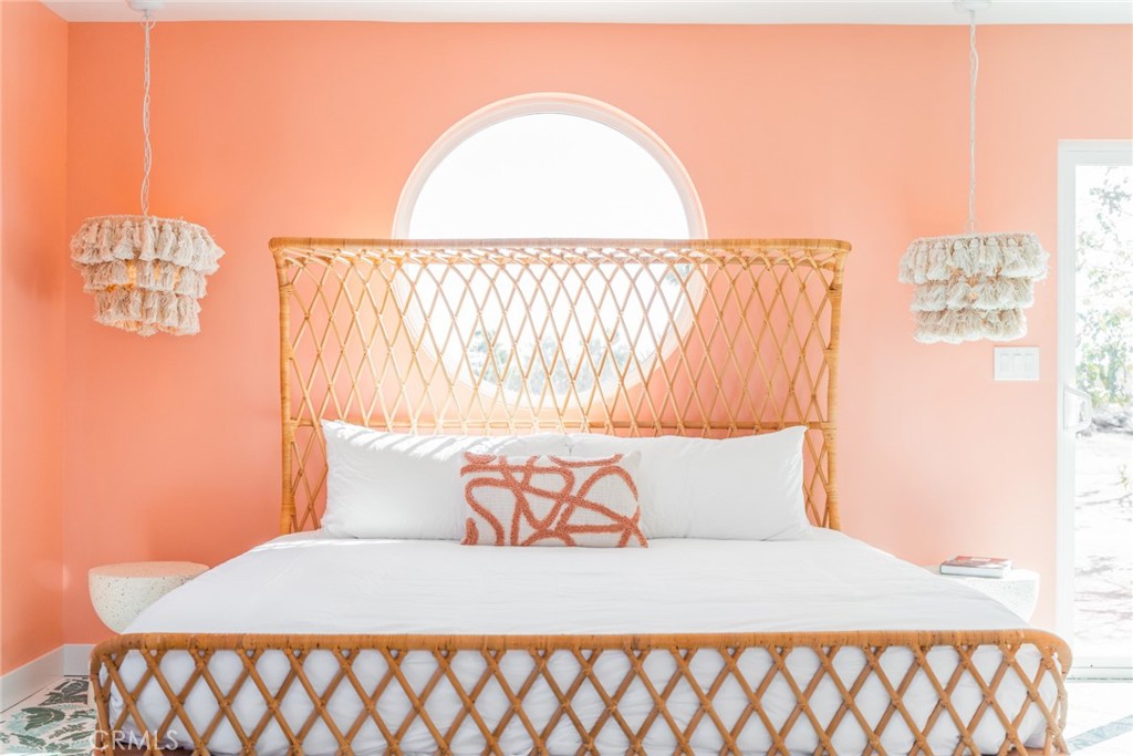 56345 Moonstone Road Yucca Valley, CA 92284 - Photo 28 of 69 a bedroom with a bed and a window