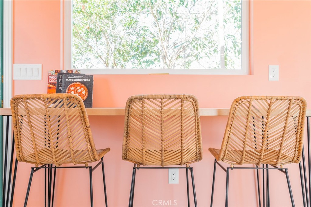 56345 Moonstone Road Yucca Valley, CA 92284 - Photo 29 of 69 a couple of white chairs sitting next to a window