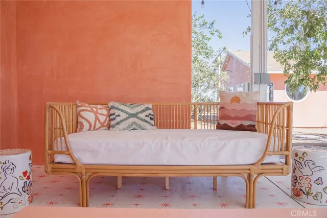 a view of front door and brick walls