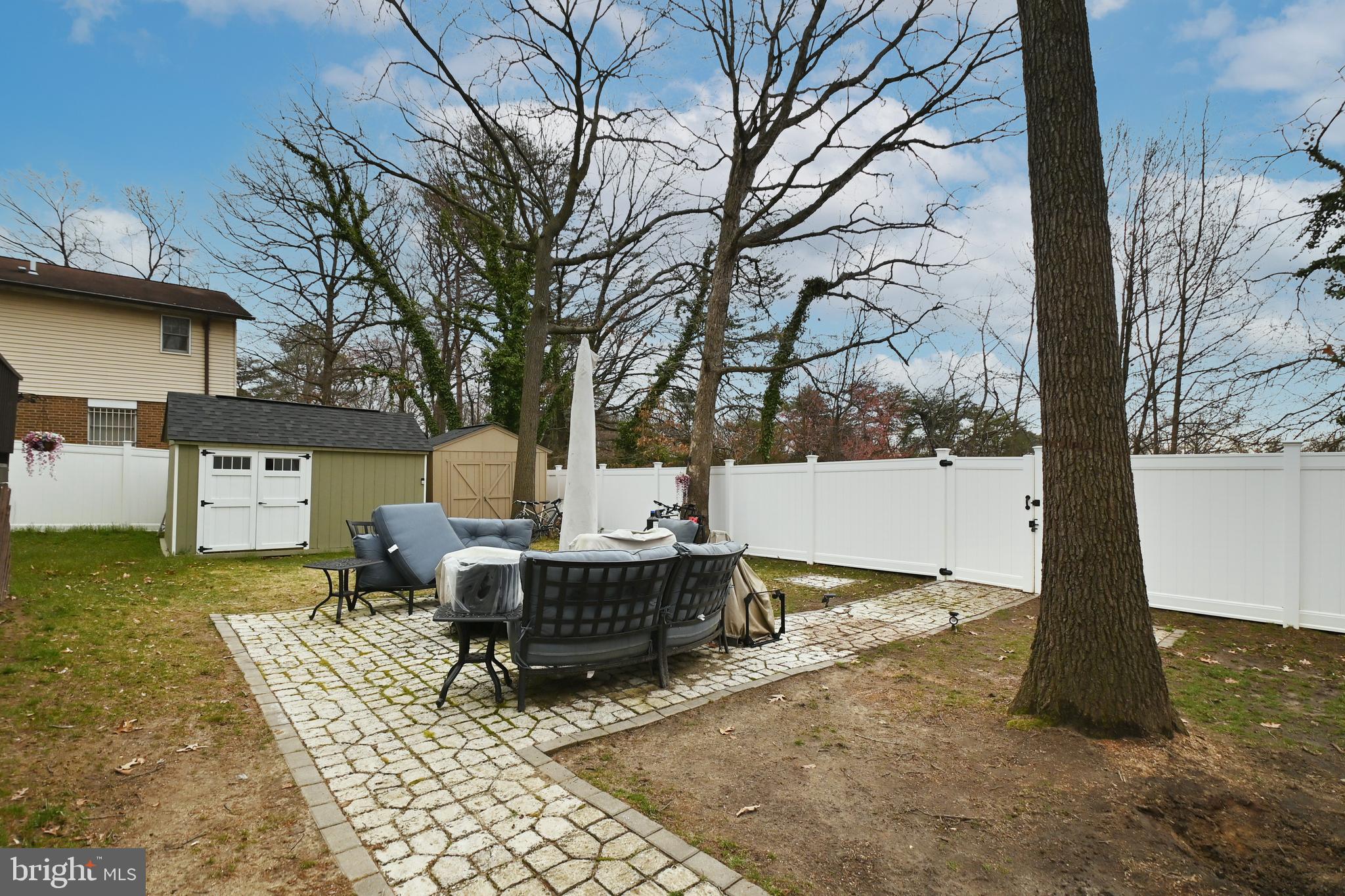 6431 Forest Road Landover, MD 20785 - Photo 38 of 42 a backyard of a house with table and chairs