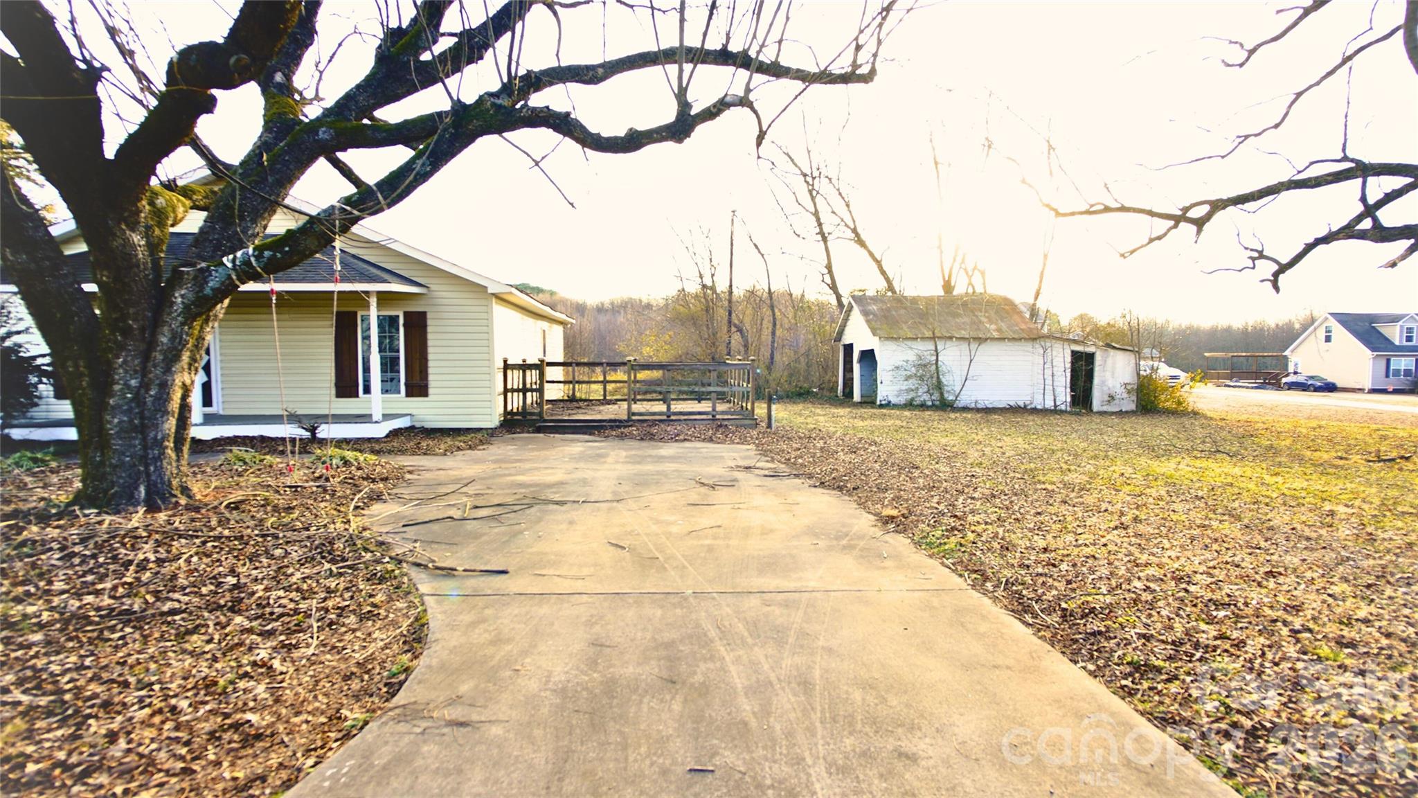 211 Webb Farm Road Shelby, NC 28152 - Photo 2 of 10 a view of a house with snow on the background