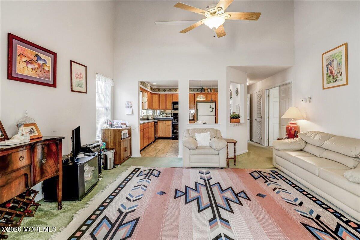 24 Merion Lane Jackson, NJ 08527 - Photo 11 of 45 a living room with furniture and wooden floor