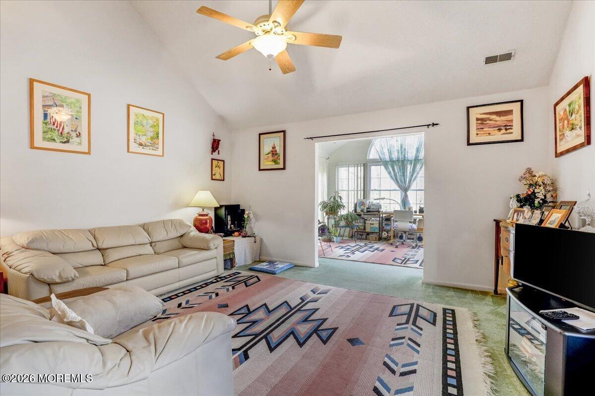 24 Merion Lane Jackson, NJ 08527 - Photo 13 of 45 a living room with furniture and a flat screen tv
