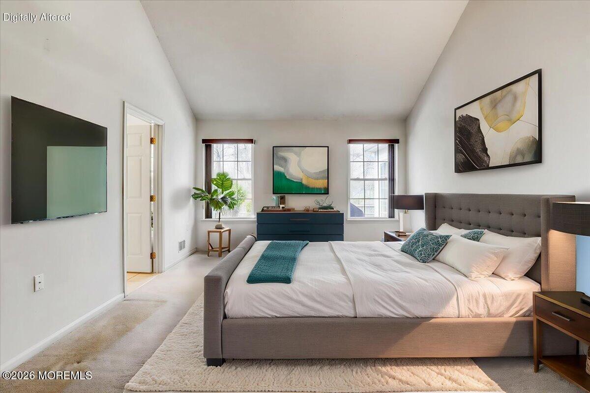 24 Merion Lane Jackson, NJ 08527 - Photo 15 of 45 a bedroom with a large bed and a couch