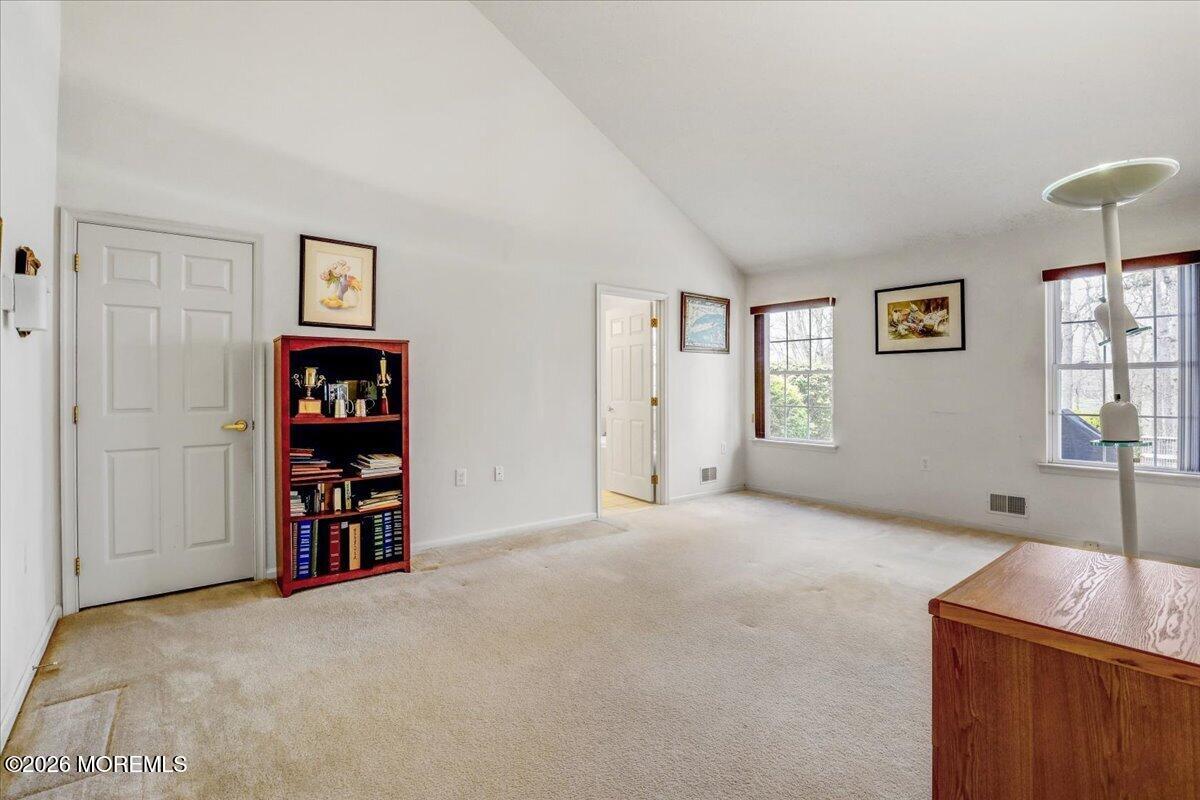 24 Merion Lane Jackson, NJ 08527 - Photo 18 of 45 a view of a bedroom with cabinet and window