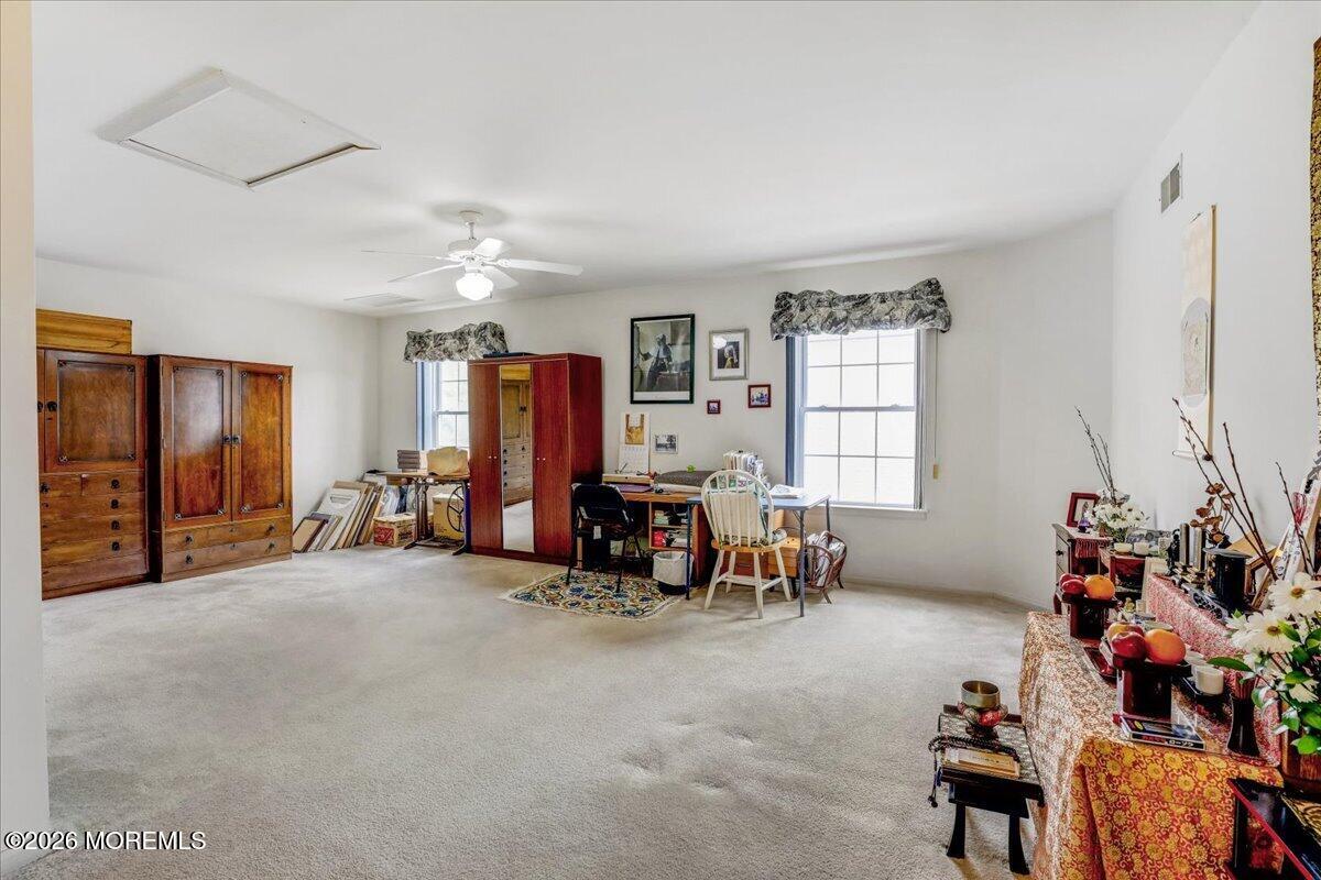 24 Merion Lane Jackson, NJ 08527 - Photo 24 of 45 a living room with furniture and a window