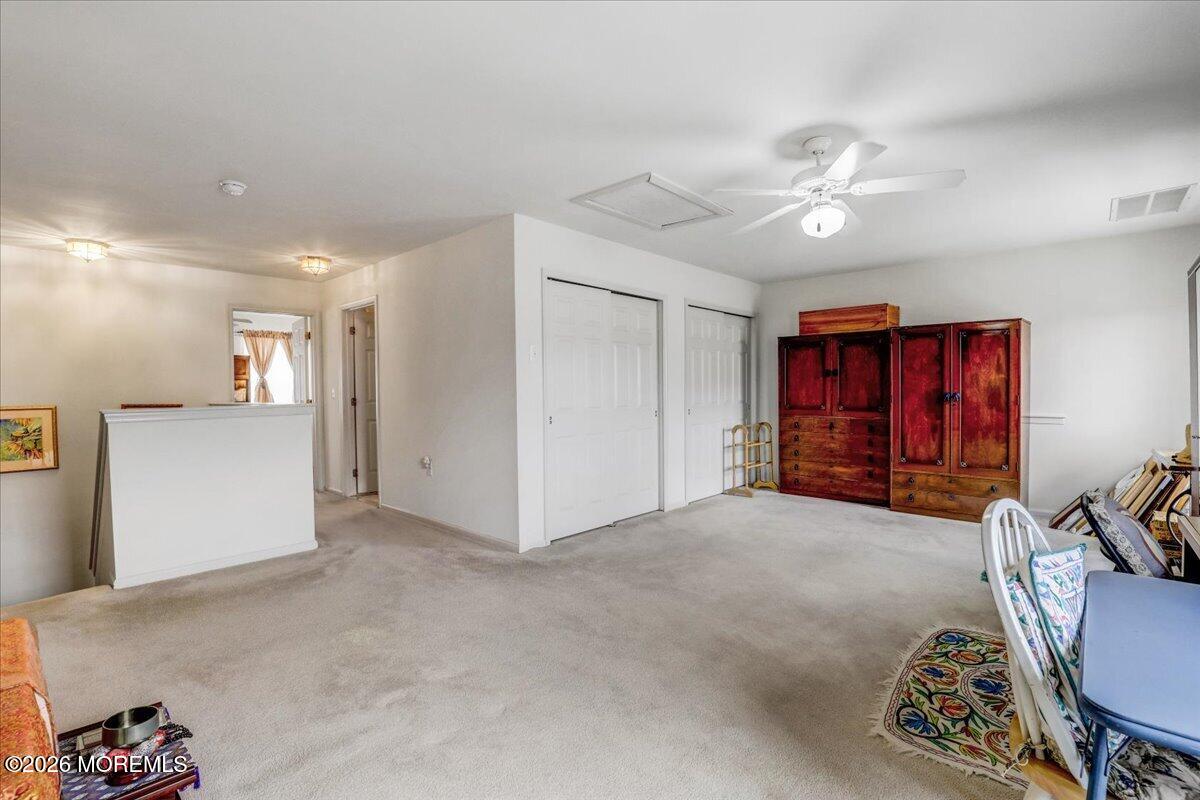 24 Merion Lane Jackson, NJ 08527 - Photo 25 of 45 a view of a livingroom with furniture and windows