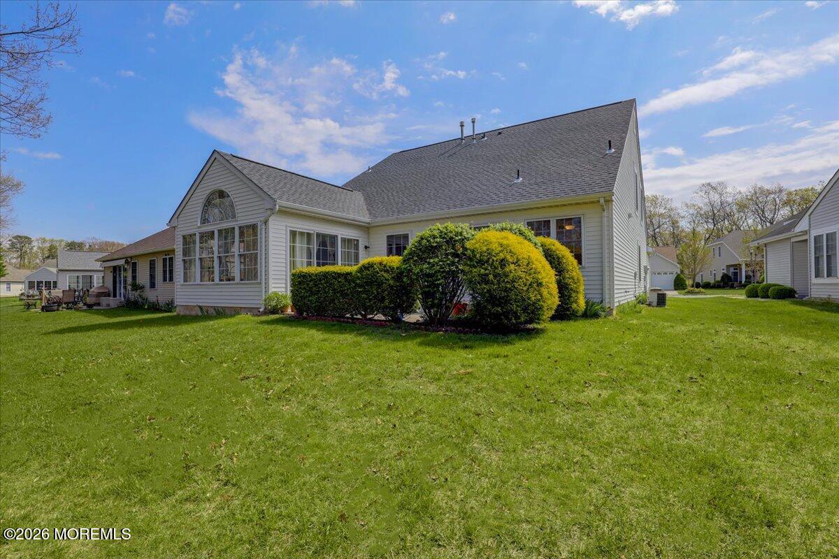 24 Merion Lane Jackson, NJ 08527 - Photo 30 of 45 a front view of a house with garden