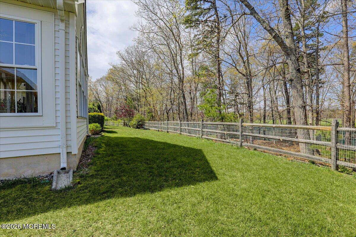 24 Merion Lane Jackson, NJ 08527 - Photo 31 of 45 a view of a house with a backyard